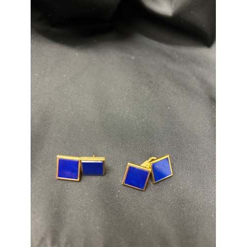 68 - Circa 1970A pair of lapis lazuli and 18 carat yellow gold cufflinksWeight:Approximately 12 grams... 