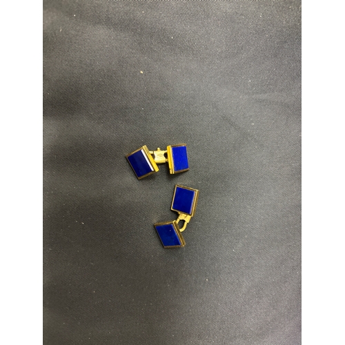 68 - Circa 1970A pair of lapis lazuli and 18 carat yellow gold cufflinksWeight:Approximately 12 grams... 