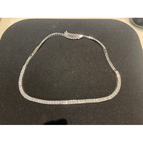 107 - An 18 carat white gold and princess cut white sapphire necklace Weight:Approximately 45 grams... 