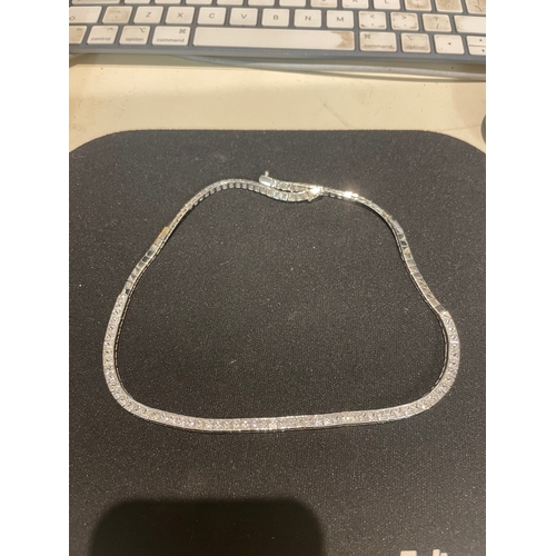 107 - An 18 carat white gold and princess cut white sapphire necklace Weight:Approximately 45 grams... 