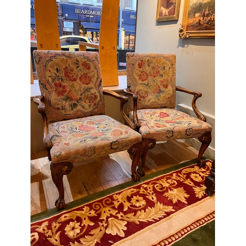 238 - 19th centuryA pair of needlework upholstered Gainsborough chairsWith profusely carved front and back... 