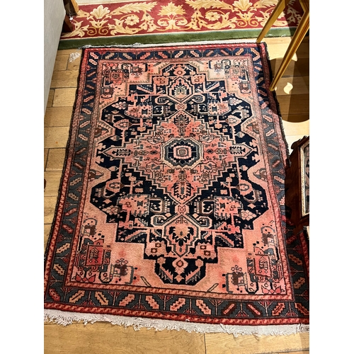 295 - Two small early- to mid-twentieth century rugs