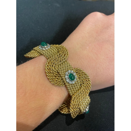 94 - Circa 1950An attractive 18 carat gold interwoven mesh emerald and diamond set braceletThe interwoven... 