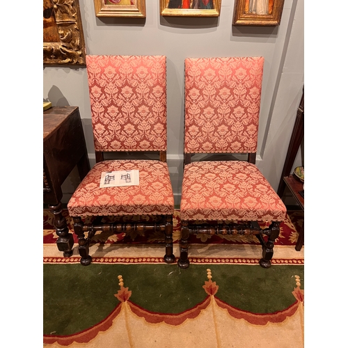 214 - 17th CenturyA pair of William and Mary walnut side chairs upholstered in dry blood damaskOn turned l... 