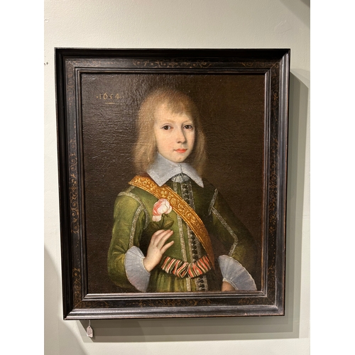 337 - British 17th century school1634, dated lower leftPortrait of a boy, half-length, in a green emb... 