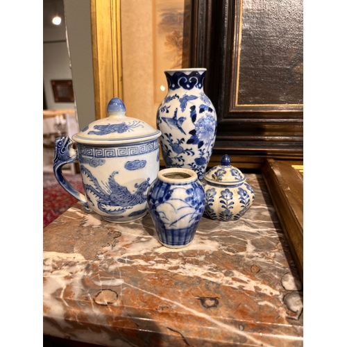 455 - Chinese18th-20th CenturyFour blue and white porcelain vessels[1] Dragon handled, lidded pot decorate... 