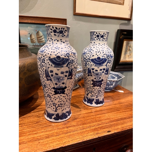 466 - To be sold without reserve Property of a GentlemanChina20th CenturyA pair of blue and white vasesOne... 