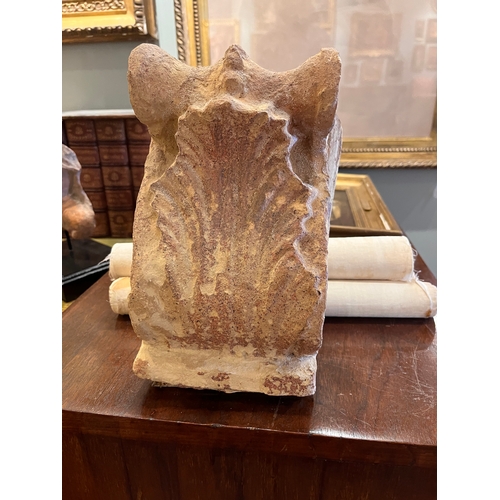 478 - AntiqueA terracotta acanthus leaf-shaped pedimentDimensions:10.5 in. (H) x 6 in. (W) x 4 in. (D)... 