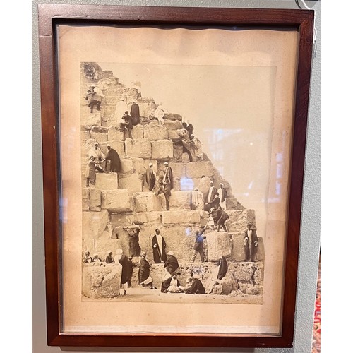 176 - People Standing on PyramidSepia photographDimensions:(Frame) 15.25 in. (H) x 12 in. (W)(Photograph) ... 