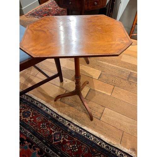 200 - English, Early 19th CenturyA satinwood octagonal tilt-top side table on three splayed legs and centr... 