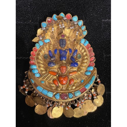 488 - Nepalese, 19th CenturyA gem set and glass gilt metal fitment and a similar gem set gilt metal pendan... 