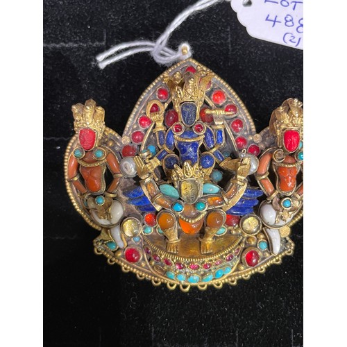 488 - Nepalese, 19th CenturyA gem set and glass gilt metal fitment and a similar gem set gilt metal pendan... 