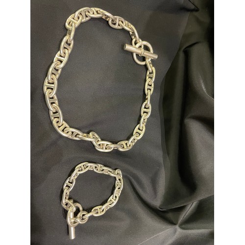 89 - HèrmesCirca 2000A matching large chaine d'ancre necklace and braceletCast in sterling silverWeight:A... 