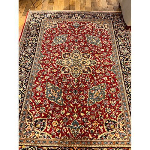 292 - Two large Persian rugsProperty of a gentlemanDimensions:[a] 118 in. (H) x 88 in. (W)[b] 169 in. (H) ... 