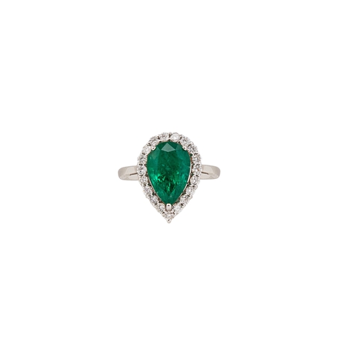 33 - A pear shaped emerald and diamond cluster ringThe pear shaped emerald of good colour within a surrou... 