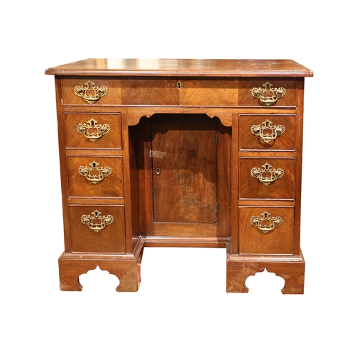 245 - Property of a LadyGeorgianA mahogany kneehole writing deskWith a large central drawers and three sma... 