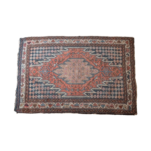 243C - Circa 1920A Persian rugDimensions:75 in. (L) x 56 in. (W)... 