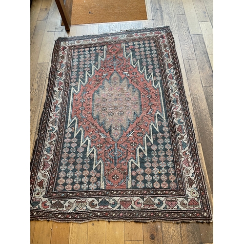 243C - Circa 1920A Persian rugDimensions:75 in. (L) x 56 in. (W)... 