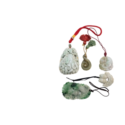 120 - Chinese20th CenturyA group of jade and jadeite pendantsComprising of seven pieces, including a laven... 