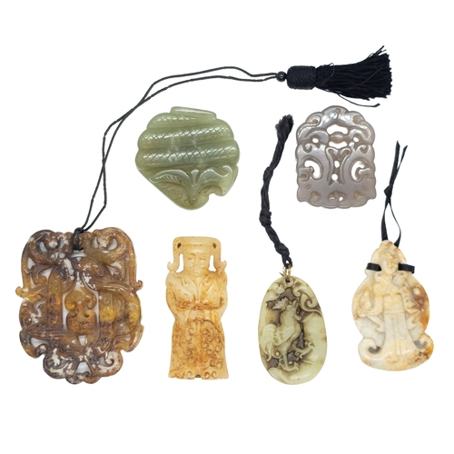 124 - Chinese20th CenturyA group of jade and hardstone pendantsComprising of six pendants, including a Chi... 