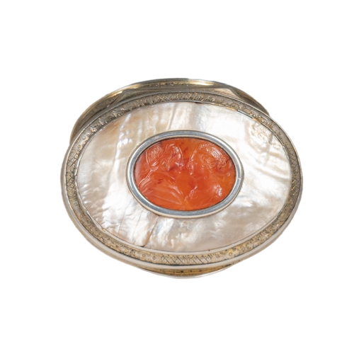 9 - EuropeanCirca 1800A mother of pearl, carnelian and silver snuff boxThe oval shaped box set to the ce... 