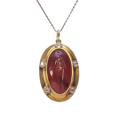 64 - A large Greek oval carnelian intaglio pendant of a Greek female figureMost likely a Goddess holding ... 