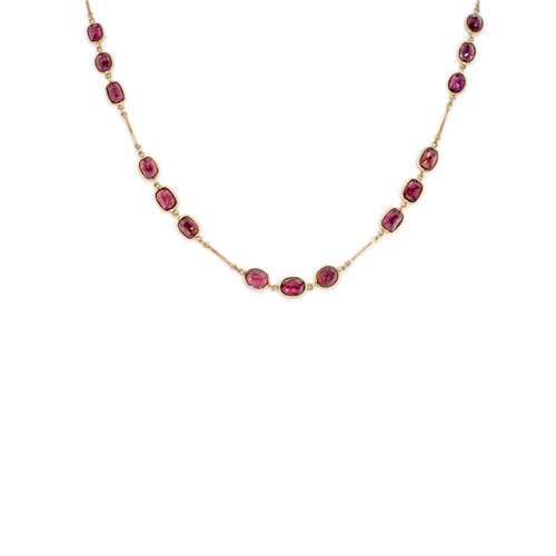 93 - EuropeanCirca 2000An almandine garnet 14 carat gold chain set alternatively with 3 oval spectacle se... 