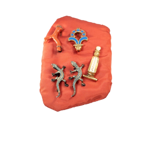 107 - Europeanearly 20 Century[a] A coral broach [b] 2 Gem set lizard broaches [c] 2 gilt metal broachesDi... 