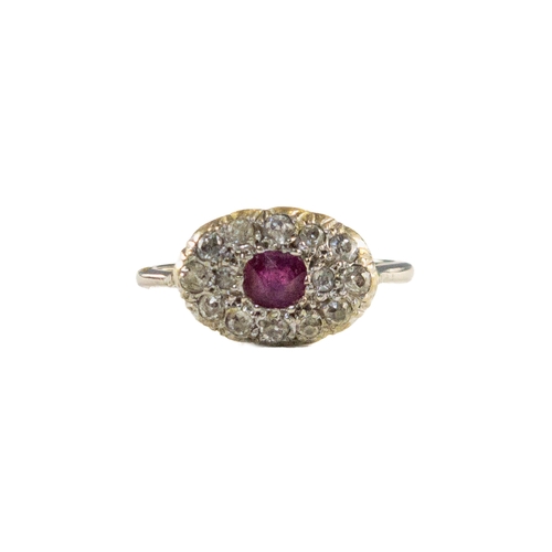 37 - Europeancirca 1920A small ruby and pave-set diamond cluster ringMounted in white goldWeight:Approx: ... 
