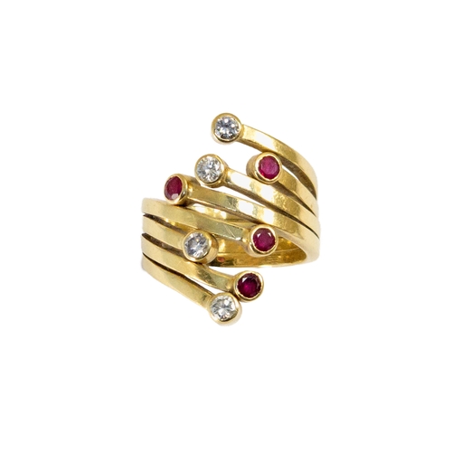 45 - Britishcirca 1970A 18ct yellow gold ruby and diamond dress ringWeight:Approx. 21gramsDimensions:Fing... 
