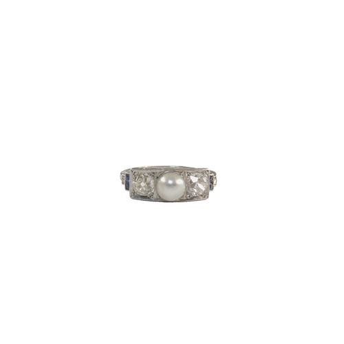 72 - EuropeanCirca 1920A diamond natural pearl and calibre cut sapphire ringMounted in platinumWeight:App... 