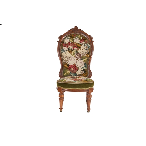 207 - VictorianA balloon-backed nursing chair with tapestry upholsteryStraight grained walnutDimensions:43... 