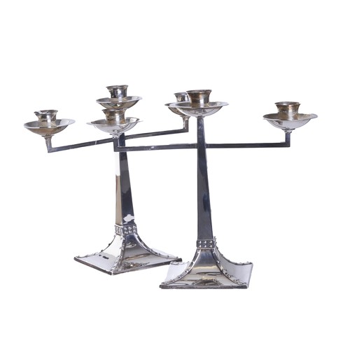 467 - Art DecoA pair of silver three light candlesticksJames Deakin and Sons hallmarkings Dimensions:8.5 i... 