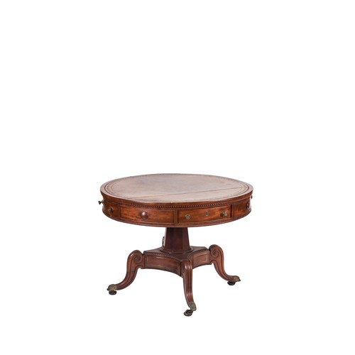 221 - 19th CenturyA drum table with embossed and gilt leather top. Tapering octagonal faceted column onto ... 