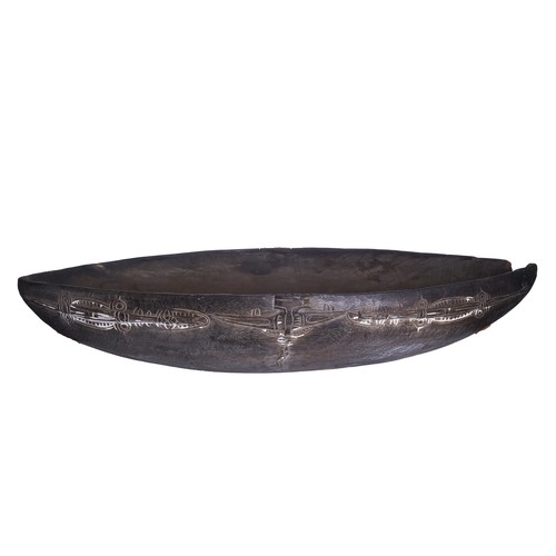 460 - Papua New GuineaA village feeding bowl19th CenturyDimensions:8.5 in. (H) x 37 in. (W) x 14.75 in. (D... 