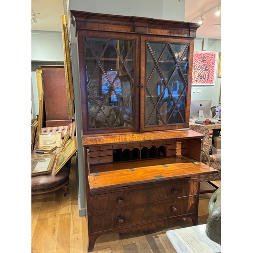 237A - 18th CenturyA secretaire book caseFitted with 12 satinwood faced desk drawersWith architectural pedi... 