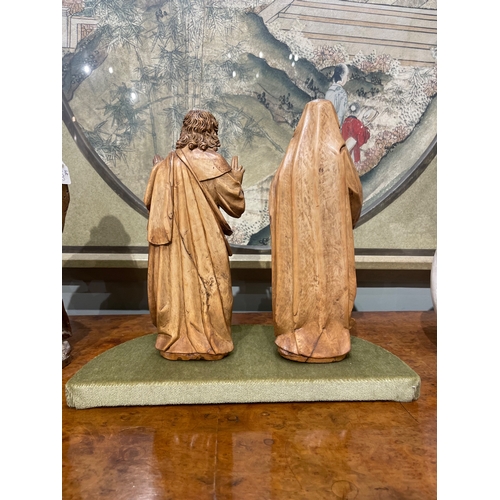 110 - Flemish16th CenturyA pair of Joseph and Mary boxwood sculptures in the roundDimensions:11.5 in. (H) ... 