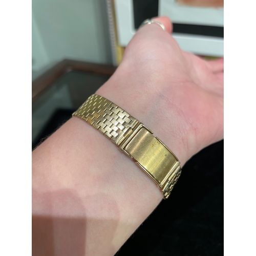 1 - Patek PhilippeCirca 1950An 18 carat gold square shaped ladies' wristwatchOn a slightly later brick l... 