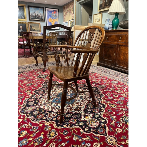 201 - Circa 1830Nicholson of RockleyA yew and elm Windsor armchairDimensions:35 in. (H) x 21.5 in. (W) x 1... 