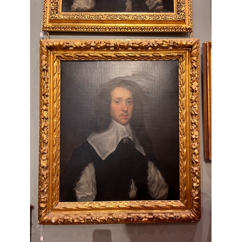 260 - Circle of William Dobson (1611 - 1646)A portrait of a young man in black jacket with white ruff and ... 