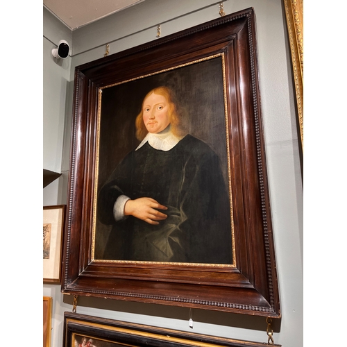 267 - Dutch SchoolEarly 17th CenturyA portrait of a distinguished gentlemanOil on panelIn a Dutch carved r... 