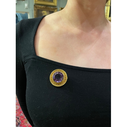 70 - EnglishCirca 1870An amethyst and gold cannetille work pendant broochWeight:Approx. 15 gramsDimension... 