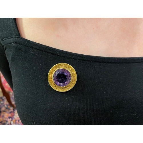 70 - EnglishCirca 1870An amethyst and gold cannetille work pendant broochWeight:Approx. 15 gramsDimension... 