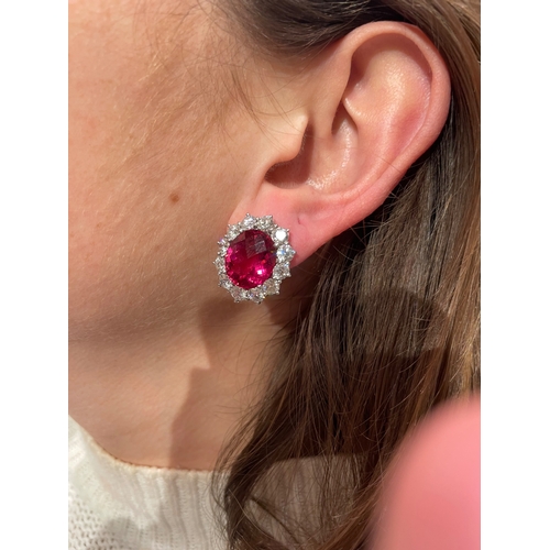 67 - An impressive pair of pink tourmaline and brilliant cut diamond cluster earringsThe oval briollete p... 