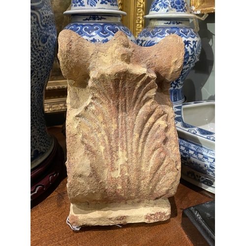 131 - AntiqueA terracotta acanthus leaf-shaped pedimentDimensions:10.5 in. (H) x 6 in. (W) x 4 in. (D)... 