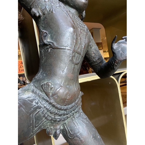 134 - South Asian18th/19th CenturyA bronze dancing deityDimensions:25 in. (H) x 11.5 in. (W)... 