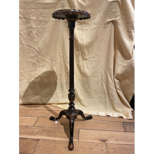 168B - An Aesthetic Movement torchere A Japanned torchere lamp stand on three feet, with fluting to co... 