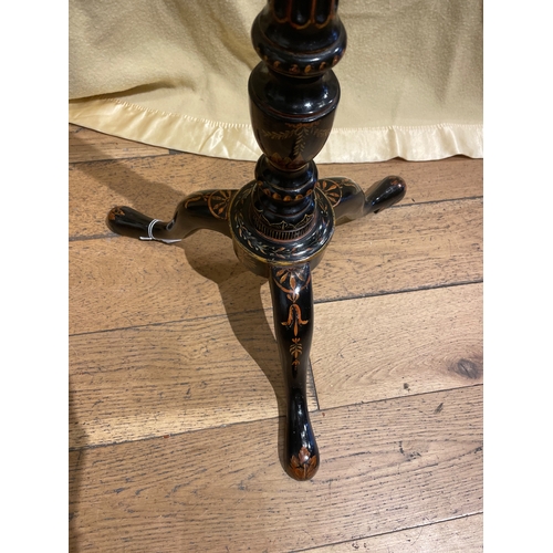 168B - An Aesthetic Movement torchere A Japanned torchere lamp stand on three feet, with fluting to co... 