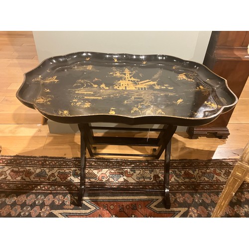 183A - 19th CenturyChinese A black lacquered tilt top tableWith gilt architectural and egret motif througho... 