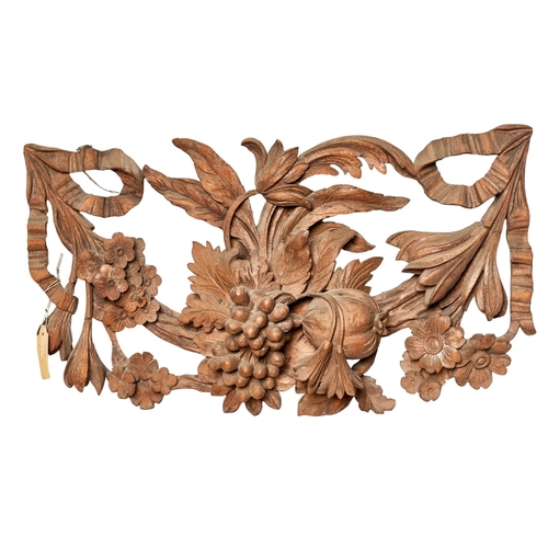 62 - British20th CenturyManner of Grinling GibbonsA group of three carved architectural elementsDecorated... 